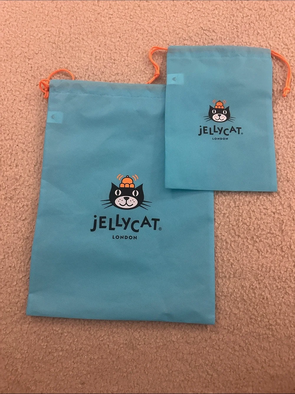 Jellycat Turquoise Blue Drawstring Cat Logo Pouches with Orange Cords